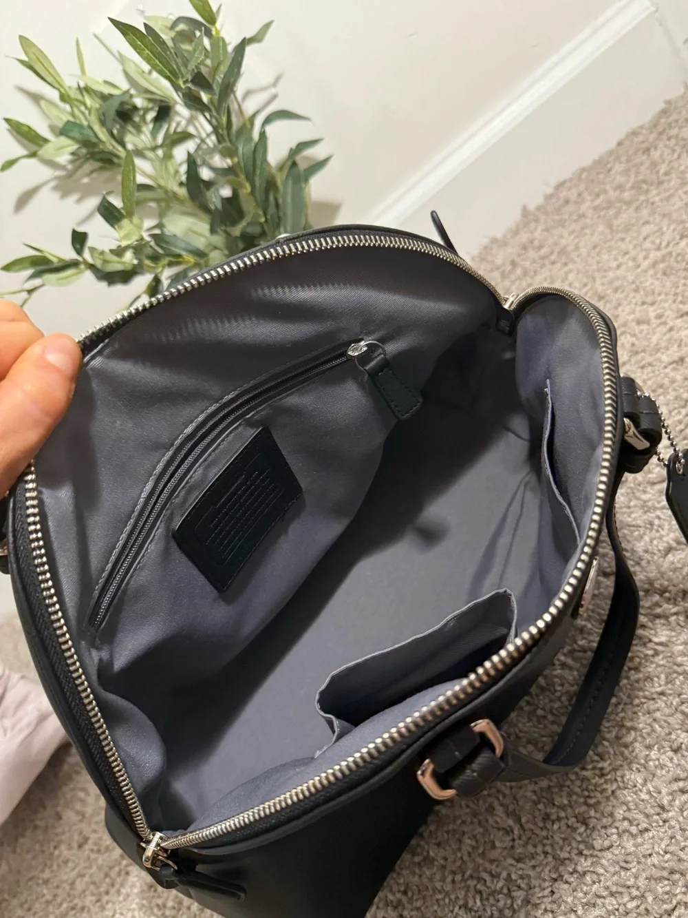 Coach sleek black